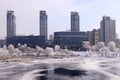 Winter view of Kiev city and the Dnieper river, fishermen ice fishing Royalty Free Stock Photo