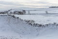 Winter view of snow covered countryside with dry stone wall. Derbyshire, UK Royalty Free Stock Photo