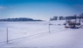 Winter view of snow covered farm fields in rural Carroll County, Maryland. Royalty Free Stock Photo