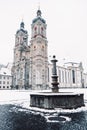 Winter view of the St Gallen abbey with a fountain in the yard, Switzerland