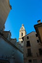 Winter view to the medieval Collegiate Basilica of Santa Maria of Xativa, Spain with blue sky on the background