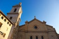 Winter view to the medieval Collegiate Basilica of Santa Maria of Xativa, Spain with blue sky on the background