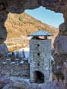 Winter view of the tower of the castle of San Michele which rises in the village of Ossana, Italy