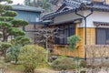 Winter view of traditional Japanese house and garden with pine tree, Tsubata, Japan Royalty Free Stock Photo