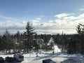 Winter Views of a Lake over the Trees and a Road