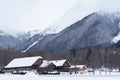 Winter village under mountain Royalty Free Stock Photo