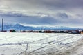 Winter village view. Snow covered mountains. Moubtains, buildings Royalty Free Stock Photo