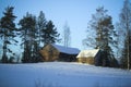 Winter Village / wooden buildings under snow