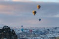 Winter warm dawn with red balloon on hotfire balloons festival, cappadocia, turkey, kappadokya