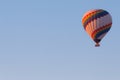 Winter warm dawn with red balloon on hotfire balloons festival, cappadocia, turkey, kappadokya