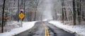 Winter Warning: School Bus Stop Ahead on Snowy Single Lane Road at 0 Royalty Free Stock Photo