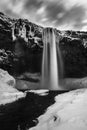 Winter waterfall Skogafoss in Iceland