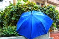Winter, Weather in Israel. Umbrella with raindrops on the fence, after the rain Royalty Free Stock Photo