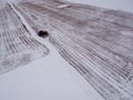 Winter wheat stubble field with snow, aerial view Royalty Free Stock Photo