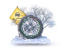 Winter wheel on the piece of snowy ground