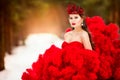 Winter Woman in Crown, Fashion Model Beauty Portrait, Red Ruched Dress Royalty Free Stock Photo