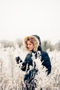 Winter woman in a frozen plant Royalty Free Stock Photo