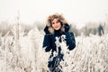 Winter woman in a frozen plant Royalty Free Stock Photo