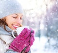 Winter woman with hot drink outdoors Royalty Free Stock Photo