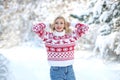 Winter woman in the snow. Beautiful girl in the winter in nature. Royalty Free Stock Photo