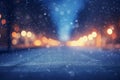 Winter Wonderland Abstract: Blurry Night City Lights in Reflection on Snowy Road Royalty Free Stock Photo