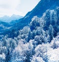 Winter wonderland and magical Christmas landscape. Snowy mountains and forest covered with snow as holiday background Royalty Free Stock Photo