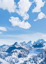 Winter wonderland and magical Christmas landscape. Snowy mountains and forest covered with snow as holiday background Royalty Free Stock Photo