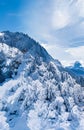 Winter wonderland and magical Christmas landscape. Snowy mountains and forest covered with snow as holiday background Royalty Free Stock Photo