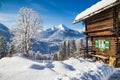 Winter wonderland with mountain chalet in the Alps