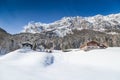 Winter wonderland with mountain chalets in the Alps Royalty Free Stock Photo