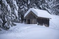 Winter wonderland with a shack at the forest Royalty Free Stock Photo