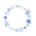 Winter wreath with snowflakes. Watercolor round frame