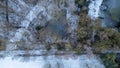 Winter's Brush: Aerial View of a Frosted Waterway