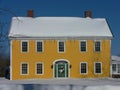 Winter: yellow house in snow Royalty Free Stock Photo