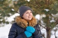 Winter young woman portrait. Beauty Joyful Model Girl laughing and having fun in winter park. Beautiful young female outdoors Royalty Free Stock Photo