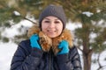 Winter young woman portrait. Beauty Joyful Model Girl laughing and having fun in winter park. Beautiful young female outdoors Royalty Free Stock Photo