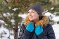 Winter young woman portrait. Beauty Joyful Model Girl laughing and having fun in winter park. Beautiful young female outdoors Royalty Free Stock Photo