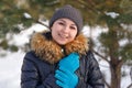 Winter young woman portrait. Beauty Joyful Model Girl laughing and having fun in winter park. Beautiful young female outdoors Royalty Free Stock Photo