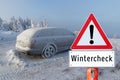 Wintercheck Sign warning shield