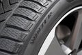 Complete winter wheel, winter tire with aluminum rim Royalty Free Stock Photo