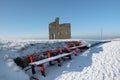 Winters path to ballybunion castle and red benches Royalty Free Stock Photo