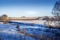 Winters scene along the banks of a river Royalty Free Stock Photo