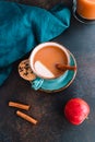 Wintertime chai-spiced apple cider with assam tea, cinnamon, ginger, cardamom and almond milk. Royalty Free Stock Photo