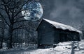 Wintery snow scenery with surreal full-moon