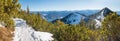 wintry footpath to Herzogstand mountain, view to snowy bavarian alps and Walchensee Royalty Free Stock Photo