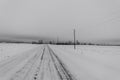 wintry road late afternoons in the countryside Royalty Free Stock Photo