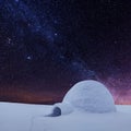 Wintry scene with resl snow igloo and milky way Royalty Free Stock Photo