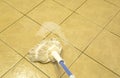 Wiped tiled floor with mop Royalty Free Stock Photo