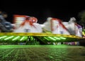 Wipeout Amusement ride night time colourful Royalty Free Stock Photo