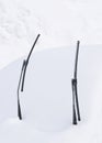 Wipers of snow covered car Royalty Free Stock Photo